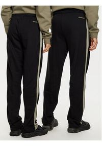 Ellesse Spodnie dresowe Unisex Nioro SHX21064 Czarny Regular Fit. Kolor: czarny. Materiał: bawełna #10