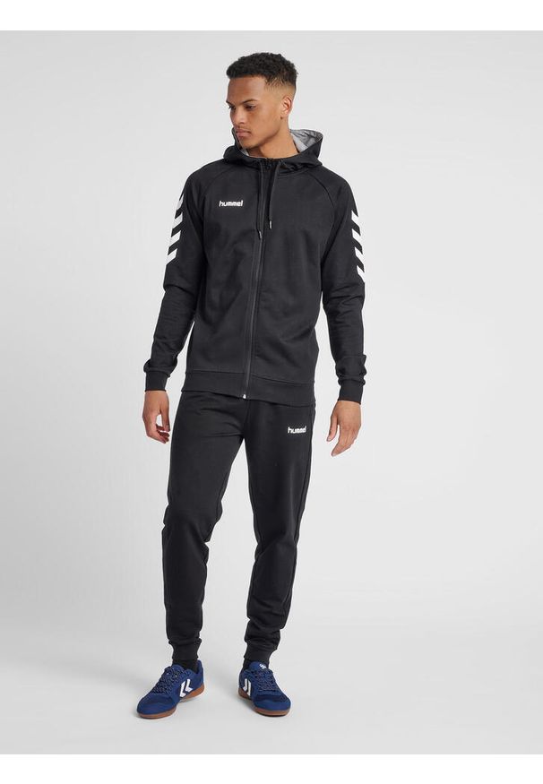 Bluza z kapturem sportowa męska Hummel Go Cotton Zip Hoodie. Typ kołnierza: kaptur. Kolor: czarny. Sport: taniec, joga i pilates