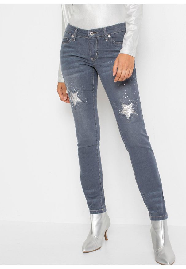 bonprix - Dżinsy Skinn, low waist, z motywem gwiazd. Kolor: niebieski
