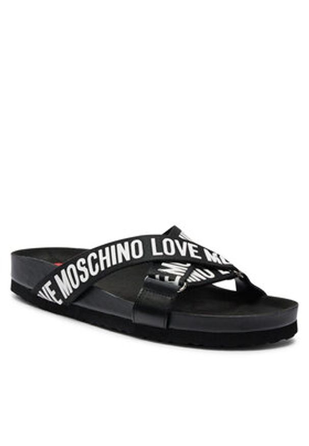 Love Moschino - LOVE MOSCHINO Klapki JA28263G0IIX100A Czarny. Kolor: czarny. Materiał: skóra