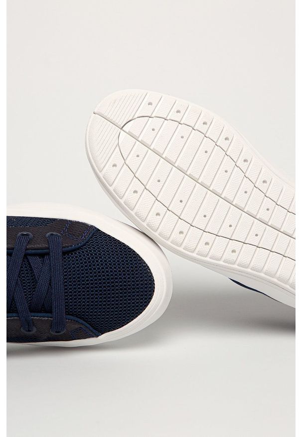 Helly Hansen Buty kolor granatowy na płaskiej podeszwie. Nosek buta: okrągły. Zapięcie: sznurówki. Kolor: niebieski. Materiał: materiał, guma. Obcas: na płaskiej podeszwie, na obcasie. Wysokość obcasa: niski