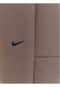 Nike Spodnie dresowe Tech Fleece HV6779 Brązowy Regular Fit. Kolor: brązowy. Materiał: bawełna