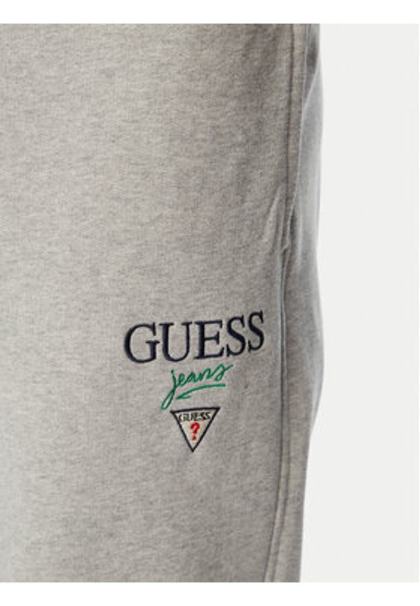 Guess Jeans Spodnie dresowe M6YB15 K4842 Szary Regular Fit. Kolor: szary. Materiał: bawełna