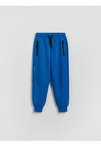 Reserved - Dzianinowe joggery - niebieski. Kolor: niebieski. Materiał: dzianina #1