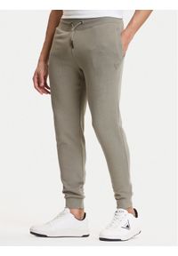 Guess Spodnie dresowe Z2YB22 KAIJ1 Zielony Regular Fit. Kolor: zielony. Materiał: bawełna #1