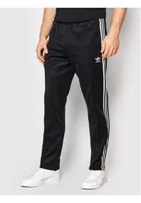 Adidas - adidas Spodnie dresowe adicolor Classics Beckenbauer Primeblue H09115 Czarny Regular Fit. Kolor: czarny. Materiał: bawełna, syntetyk