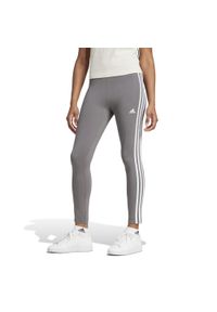 Adidas - Legginsy fitness damskie ADIDAS. Stan: podwyższony. Kolor: szary. Materiał: elastan, bawełna, materiał. Wzór: paski. Sport: fitness