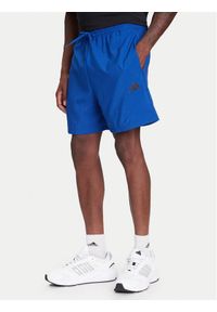 Adidas - adidas Szorty sportowe Essentials Small Logo Chelsea JF1116 Niebieski Regular Fit. Kolor: niebieski. Materiał: syntetyk. Styl: sportowy