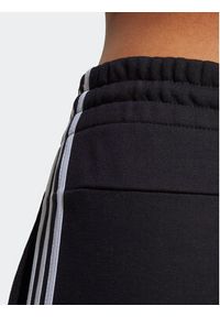 Adidas - adidas Spodnie dresowe Essentials 3-Stripes French Terry Cuffed Joggers IC8770 Czarny Slim Fit. Kolor: czarny. Materiał: bawełna #8
