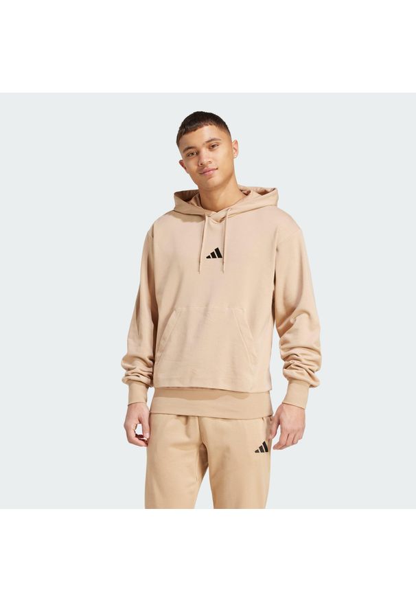 Adidas - Bluza z kapturem Essentials Feelcozy French Terry. Typ kołnierza: kaptur. Kolor: wielokolorowy, beżowy, czarny. Materiał: materiał
