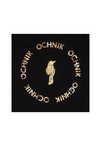 Ochnik - Czarny T-shirt damski z aplikacją. Kolor: czarny. Materiał: wiskoza. Wzór: aplikacja