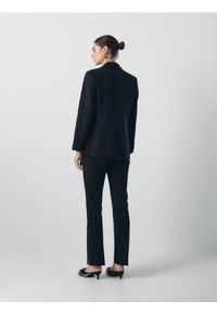 Reserved - Spodnie z ozdobnymi wstawkami - czarny. Kolor: czarny. Materiał: tkanina, wiskoza. Wzór: gładki #1