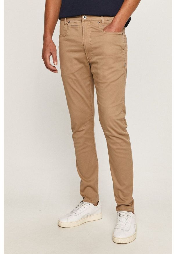 G-Star RAW - G-Star Raw - Spodnie. Kolor: beżowy