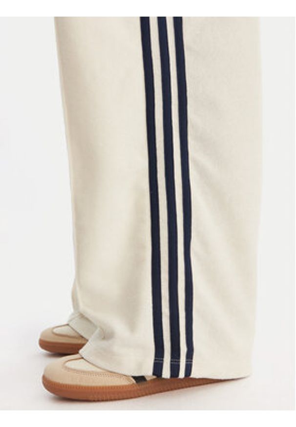 Adidas - adidas Spodnie dresowe Terry Towel Firebird KQ6663 Écru Loose Fit. Materiał: bawełna