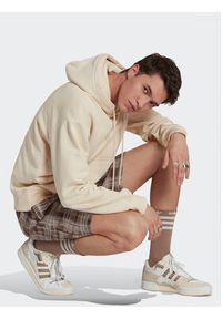 Adidas - adidas Szorty sportowe Reveal Allover Print HM4949 Brązowy Regular Fit. Kolor: brązowy. Materiał: bawełna. Wzór: nadruk. Styl: sportowy
