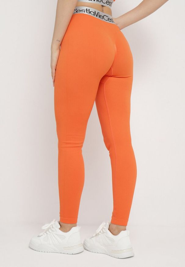 Born2be - Pomarańczowe Elastyczne Legginsy z Szeroką Gumą w Pasie Rindama. Kolor: pomarańczowy. Materiał: guma. Styl: sportowy