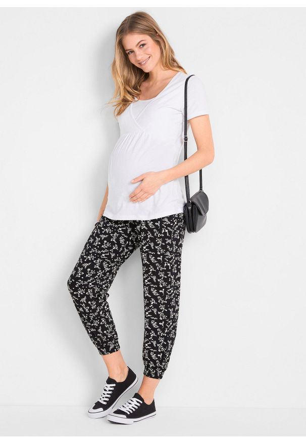 bonprix - Spodnie ciążowe z modnym nadrukiem, z mieszanki wiskozy, loose fit. Kolekcja: moda ciążowa. Kolor: czarny. Materiał: wiskoza, materiał. Wzór: nadruk, kwiaty
