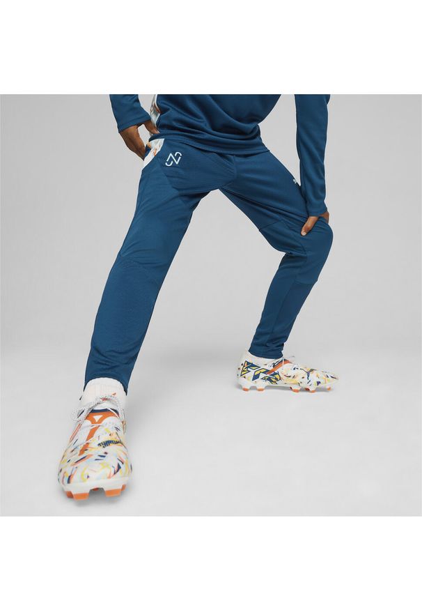 Spodnie Puma Neymar Jr Creativity Training Pants Jr, Dzieci. Kolor: niebieski, pomarańczowy, wielokolorowy. Materiał: poliester, materiał