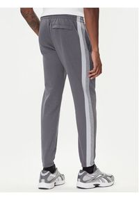 Under Armour Spodnie dresowe Ua Rival Fleece Colorblock 6003954 Szary Loose Fit. Kolor: szary. Materiał: bawełna #4