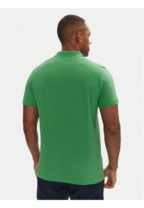 Tommy Jeans Polo DM0DM20676 Zielony Slim Fit. Typ kołnierza: polo. Kolor: zielony. Materiał: bawełna