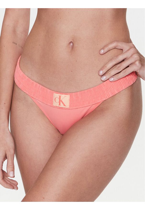 Dół od bikini Calvin Klein Swimwear. Kolor: pomarańczowy. Materiał: syntetyk