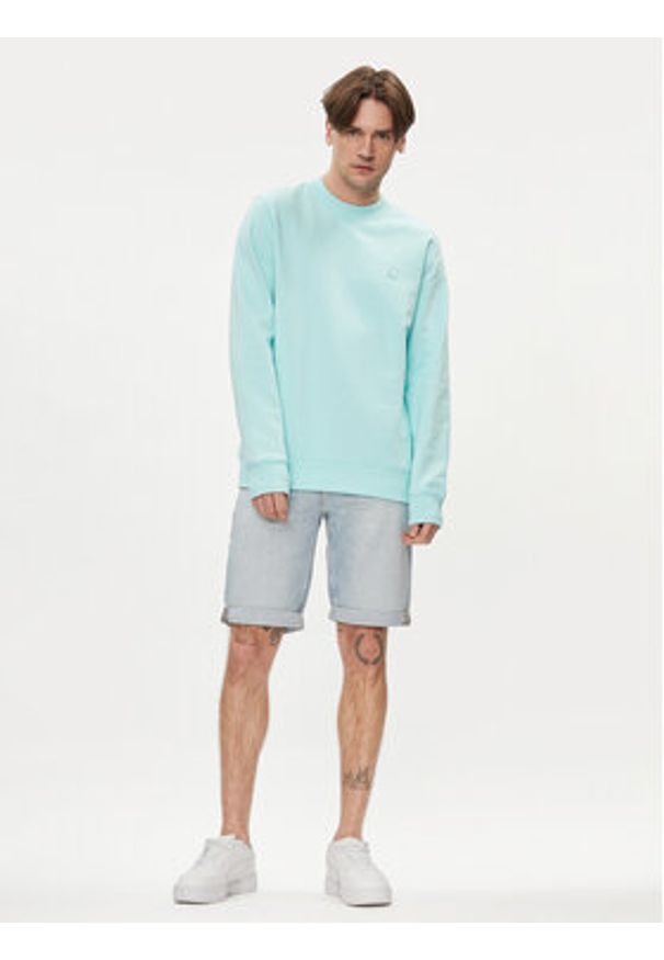 Calvin Klein Jeans Szorty jeansowe J30J324871 Niebieski Slim Fit. Kolor: niebieski. Materiał: bawełna