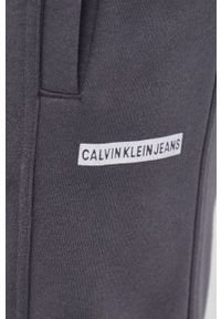 Calvin Klein Jeans Spodnie męskie kolor szary gładkie. Kolor: szary. Materiał: bawełna, włókno, dzianina. Wzór: gładki #3