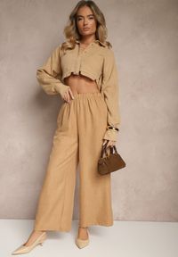 Renee - Ciemnobeżowe Spodnie Typu Palazzo High Waist o Szerokim Kroju Arathira. Okazja: na co dzień, na imprezę. Stan: podwyższony. Kolor: beżowy. Materiał: jedwab. Długość: długie. Styl: elegancki, casual
