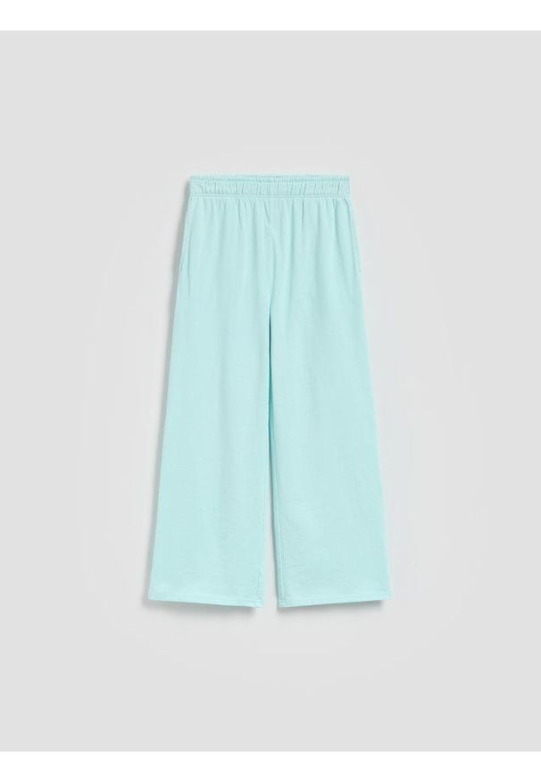 Reserved - Bawełniane spodnie dresowe - jasnoturkusowy. Kolor: turkusowy. Materiał: bawełna, dresówka