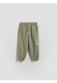 Reserved - Bawełniane spodnie - jasnozielony. Kolor: zielony. Materiał: bawełna #1