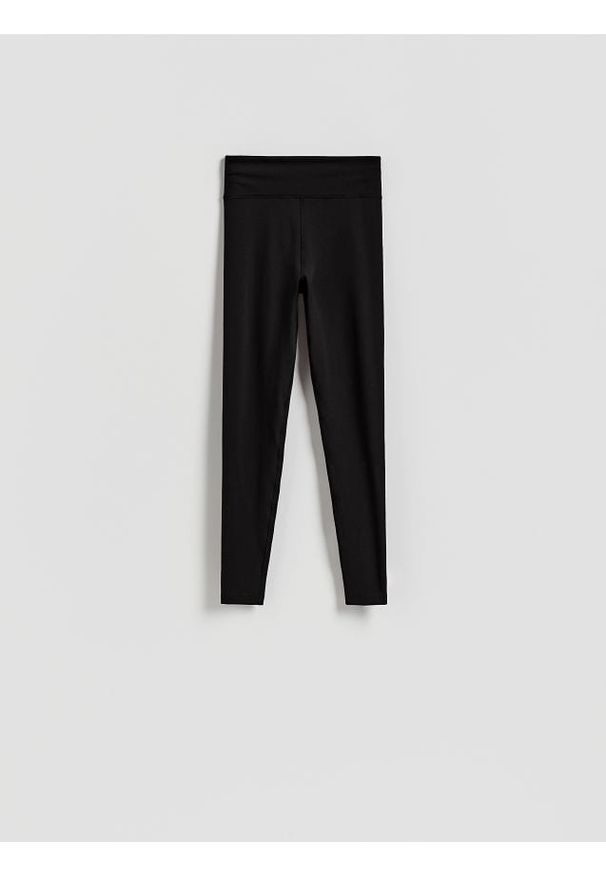 Reserved - Gładkie legginsy - czarny. Kolor: czarny. Materiał: dzianina. Wzór: gładki