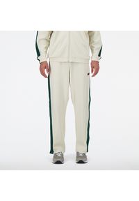 Spodnie męskie New Balance MP41504LIN – beżowe. Kolor: beżowy. Materiał: dresówka, bawełna, tkanina