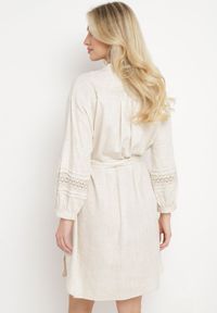 Born2be - Beżowa Sukienka Koszulowa Zapinana na Guziki z Paskiem w Talii i Ozdobnym Rękawem Rigaudona. Okazja: na spotkanie biznesowe. Kolor: beżowy. Typ sukienki: koszulowe. Styl: biznesowy, elegancki, klasyczny #6