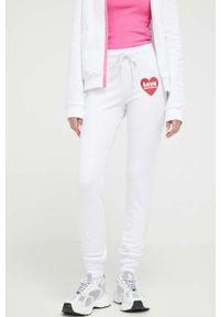 Love Moschino spodnie dresowe kolor biały z nadrukiem. Kolor: biały. Materiał: dresówka. Wzór: nadruk #1