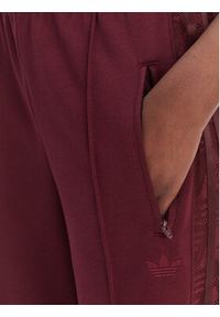 Adidas - adidas Spodnie dresowe Firebird Lace KC6445 Bordowy Loose Fit. Kolor: czerwony. Materiał: syntetyk #4