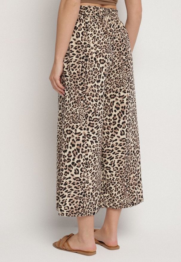 Born2be - Beżowo-Czarne Spodnie o Szerokim Kroju z Gumką w Talii w Panterkę Filassena. Okazja: na co dzień. Kolor: czarny. Wzór: motyw zwierzęcy. Styl: casual, elegancki