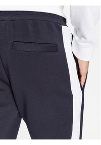 BOSS - Boss Spodnie dresowe 50493505 Granatowy Regular Fit. Kolor: niebieski. Materiał: bawełna
