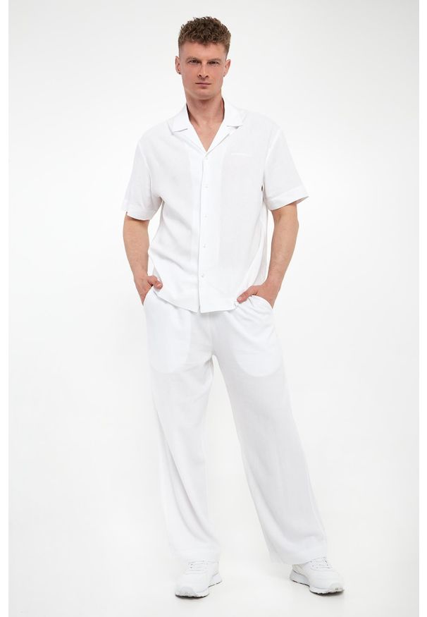 Emporio Armani Swimwear - Spodnie męskie z lnem EMPORIO ARMANI SWIMWEAR. Materiał: len