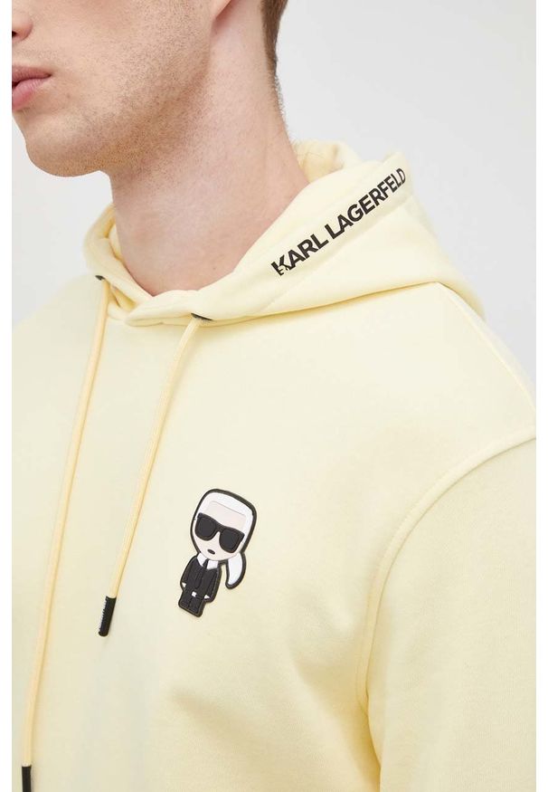 Karl Lagerfeld bluza męska kolor żółty z kapturem z aplikacją. Okazja: na co dzień. Typ kołnierza: kaptur. Kolor: żółty. Materiał: materiał. Wzór: aplikacja. Styl: casual