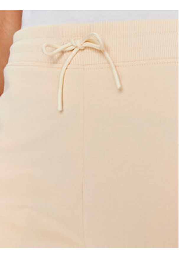 Hugo Spodnie dresowe Easy 50509171 Beżowy Relaxed Fit. Kolor: beżowy. Materiał: bawełna