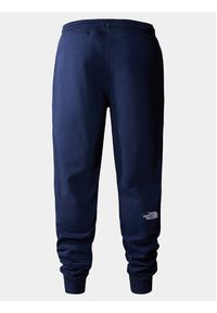The North Face Spodnie dresowe Nse Light NF0A4T1F Granatowy Regular Fit. Kolor: niebieski. Materiał: bawełna #4