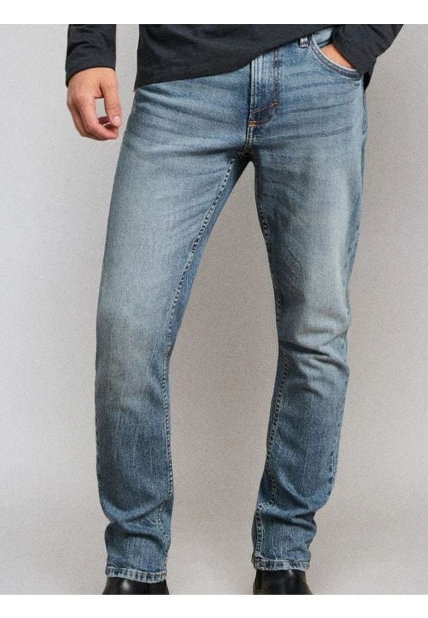 Sinsay - Jeansy slim fit z efektem sprania - zielony. Kolor: zielony