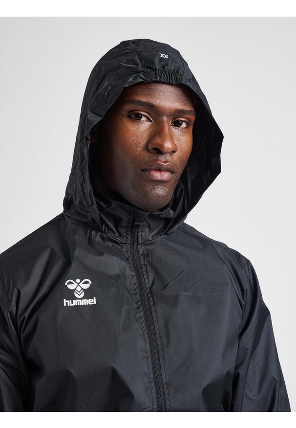 Kurtka ortalionowa piłkarska dla dorosłych Hummel Core XK Spray Jacket. Kolor: czarny. Sport: piłka nożna
