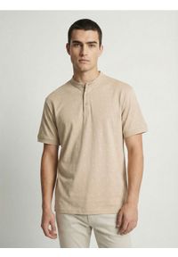 Sinsay - Bawełniana koszulka polo - kremowy. Typ kołnierza: polo. Kolor: kremowy. Materiał: bawełna