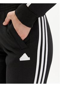 Adidas - adidas Spodnie dresowe Future Icons 3-Stripes IN9479 Czarny Regular Fit. Kolor: czarny. Materiał: bawełna, syntetyk