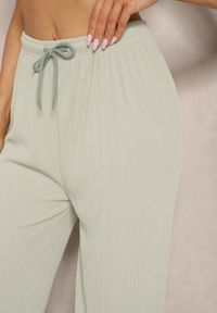 Renee - Jasnozielone Spodnie o Szerokim Kroju High Waist Ozdobione Sznurkami Harisna. Okazja: na co dzień. Stan: podwyższony. Kolor: zielony. Wzór: aplikacja. Styl: casual #5
