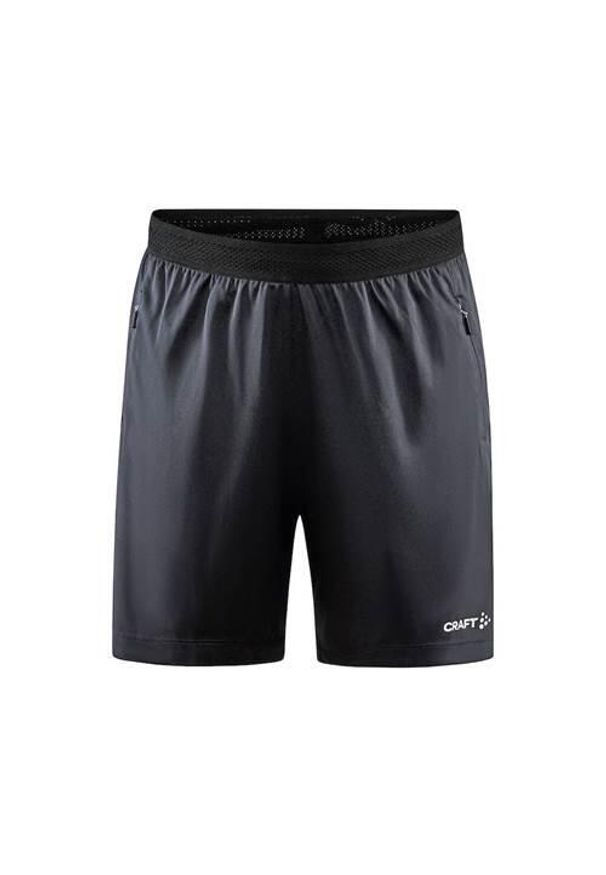 Spodnie treningowe damskie Craft Evolve Zip Pocket. Kolor: czarny, wielokolorowy, niebieski. Materiał: materiał, syntetyk. Długość: krótkie