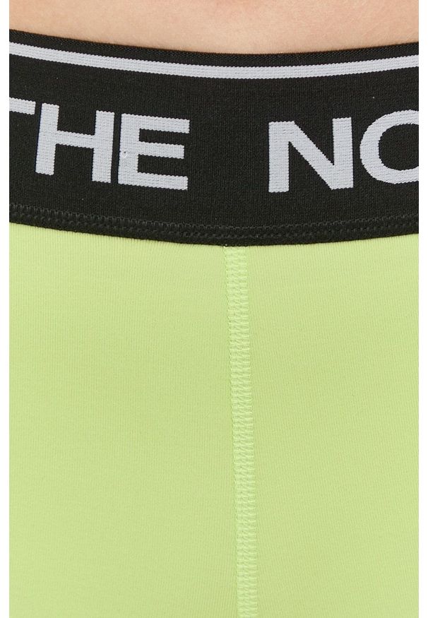 The North Face szorty sportowe damskie kolor zielony z nadrukiem medium waist. Kolor: zielony. Materiał: skóra. Wzór: nadruk. Styl: sportowy