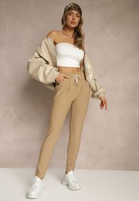 Renee - Beżowe Dopasowane Spodnie High Waist z Gumką i Wiązaniem w Talii Zelpia. Okazja: na co dzień. Stan: podwyższony. Kolor: beżowy. Styl: casual, elegancki #1