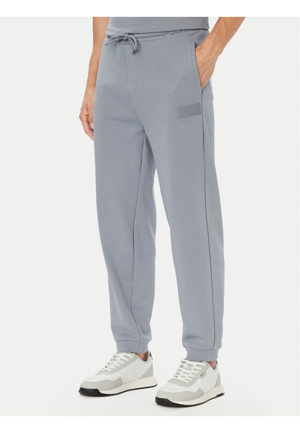 BOSS Spodnie dresowe JT_Long 50564096 Szary Relaxed Fit. Kolor: szary. Materiał: bawełna